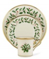 Lenox's popular holiday dinnerware pattern – a colorful holly and berry motif – on ivory fine china is the perfect way to add warmth to your decor. Trimmed with 24 karat gold.