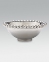 This rounded bowl in handcrafted of sandcast recycled aluminum has a pretty beaded rim. From the use of these raw materials to the design process, every step is ecologically sound, contributing to a cleaner environment. From the String of Pearls Collection 2¼H X 6D Wipe clean Imported