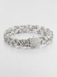 An intricately braided, sterling silver design accented with a dazzling diamond encrusted closure. Sterling silverDiamonds, .42 tcwLength, about 7.25Push clasp closureImported 