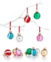 Swirling with snow-white glitter, these Martha Stewart Collection mini ornaments mix classic Christmas red and green with cheery candy colors.