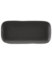 Find stylish versatility in the organic shape and matte-glazed finish of the Casual Luxe hors d'oeuvres tray from Donna Karan by Lenox. Durable stoneware in modern black is an ideal host for everyday meals and a natural go-to for entertaining.