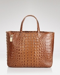 Work fashion's favorite exotic trend into your daytime uniform with this Furla tote, crafted of croc embossed leather.