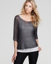 Metallic filming lends a subtle sparkle and shimmer to this laid-back Vince sweater we love.