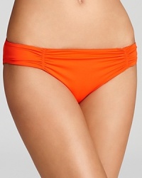 A ruched design flatters from all angles. Bikini bottom by L*Space.