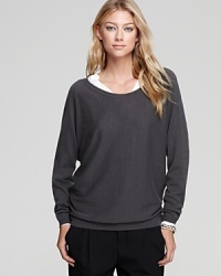 A classic cashmere crewneck, updated with a V back, this Vince sweater is easy to layer and stands on its own.