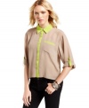 Nuclear neon accents pop against the neutral tone of this button-down high-low top from Ali & Kris!