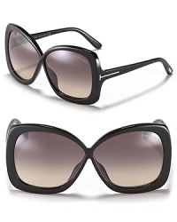 Exude elegance in oversized squared sunglasses with a criss-cross silhouette and gradient lenses.