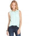 A beaded collar brings urban-luxe style to this sleeveless button-down top -- the perfect addition to your fashion-forward day look! From Ali & Kris.