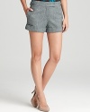 Slip brightly-colored tights or leggings beneath these leg-baring Trina Turk shorts for a fun fall look--classically cuffed, these stylish shorties cast a chic new look on a traditional tweed.