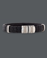 Sleek sophistication. This stylish men's cuff bracelet features a genuine crocodile band, sterling silver accents, and round-cut black diamonds (1/4 ct. t.w.). Approximate length: 8-1/2 inches. Approximate width: 1/2 inch.