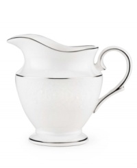 Beautiful and bridal-inspired, this white creamer is richly textured with a delicate floral motif and raised, beaded accents. Finished with a band of polished platinum.