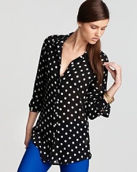 Enlivened by a retro polka-dot print, this Karen Kane shirt infuses your workweek repertoire with vintage appeal. Team with colored trousers for vibrant polish.