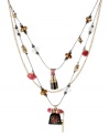 Become the talk of the town with this illusion necklace from Betsey Johnson. Crafted from gold-tone mixed metal, the necklace features glass telephone, lip and lipstick charms throughout. Approximate length: 16 inches + 3-inch extender. Approximate drop: 3 inches.