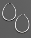 Big style with widespread appeal. These Fossil hoop earrings are crafted in silvertone mixed metal. Approximate drop: 2-1/4 inches. Approximate diameter: 1-1/2 inches.