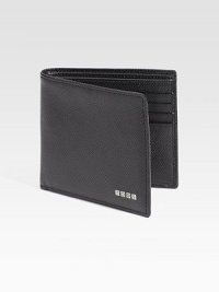 A timeless leather classic, elegantly appointed in lightly textured leather with logo accents.Two billfold compartmentsEight card slotsLeather4½W x 3¾HMade in Italy