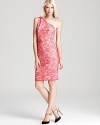 An illusion neckline lends a one-shouldered look to a vibrant lace dress from ERIN Erin Fetherston.