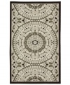 This Lisbon accent rug from Bacova works well with modern and traditional decors, featuring a center medallion design in a neutral color palette. Woven loop construction gives the rug a unique texture while skid-resistant backing offers a safety element.