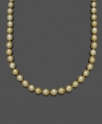 Like drops of gold washed onto the beach, this extraordinary pearl necklace features oval-shaped south sea pearls (10-12 mm) set in 14k gold. Approximate length: 18 inches.