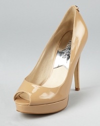 In slick patent leather, these MICHAEL Michael Kors pumps lend timeless style to the office and after hours.