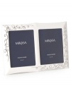 Show your romantic side. Loopy platinum hearts in white porcelain make Mikasa's Love Story double invitation frame a beautiful showcase for your favorite wedding photo and invitation.