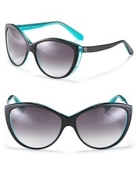 Chic cat eye sunglasses with a bright blue interior for a colorful surprise.