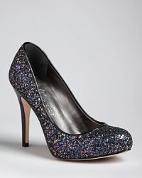 Glitter and a patent heel makes this pair of IVANKA TRUMP platform pumps shine.