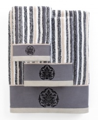 Sweet serenity. Offering a romantic and elegant composition for your bath space, this Aquarelle Embroidery hand towel features beautiful stripes in sophisticated hues. Embellished with subtle embroidery along the hem.