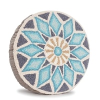 Drawing Eastern inspiration from the sun, this decorative pillow radiates style in any setting.