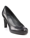 Leather platform pumps from Stuart Weitzman, an everyday shoe for the working girl.