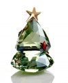 m076483 7/20/11 2:13 PM: This cute Christmas tree sparkles in Peridot Silver Shade crystal decorated with delightful little crystal stars and balls. The specially designed base allows this adorable creation to rock gently back and forth at the touch of your hand. It combines perfectly with the Rocking Reindeer and Rocking Snowman.