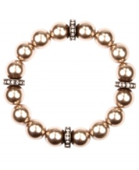 Give in to a little glamour. Givenchy's sparkling stretch bracelet combines blush-hued glass pearls with sparkling crystal-encrusted spacers. Bracelet stretches to fit wrist. Approximate diameter: 2-1/8 inches.