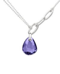 Purple reigns: The tanzanite-colored crystal in Swarovski's drop pendant necklace shows off the rich, regal hue in its best light. Crafted in silver tone mixed metal with a link detail chain. Approximate length: 15 inches. Approximate drop: 1 inch.