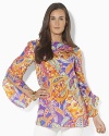 A sweeping paisley pattern and flowing silhouette combine to create the bold Reiden tunic in luxe silk.