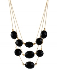 Believe your eyes when looking at this frontal necklace from Kenneth Cole New York. Crafted from gold-tone mixed metal, black faceted beads appear in multiple rows for a dazzling effect. Approximate length: 16 inches + 3-inch extender. Approximate drop: 3 inches.