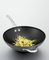 Stir things up with this versatile 12 nonstick flat-bottom wok. Part of the Contemporary Nonstick Collection, it has a unique vessel shape and hard-anodized aluminum construction. Intelligent features like a capacity indicator line on the rim and an ergonomic handle that stays cool during stovetop cooking will make it a new staple in your kitchen. Lifetime warranty.