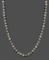 Polish your look with versatile color. Necklace features graduated, grey labradorite beads (8-9 mm) and a 14k gold clasp. Approximate length: 18 inches.