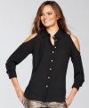 Not your average shirt, INC's festive version features sparkling rhinestone buttons and alluring shoulder cutouts!