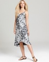 A cool tie-dye print imbues this balmy-season Velvet by Graham & Spencer dress with getaway-chic style.