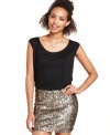 Mimi Chica teams a neutral top with a fun sequin skirt on a dress that serves-up chic party style!