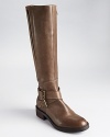 Enzo Angiolini delivers put-together, work or play style in these slickly designed riding boots. An extended calf design makes them easy to slip on over your heavier jeans.