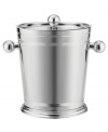 Serve cocktails chilled with this large ice bucket. In polished stainless steel, this classic set adds a touch of elegance to your home bar. Includes tongs.