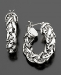 A thick, classic braid adds depth and intrigue to these silvertone mixed metal hoop earrings by Lauren by Ralph Lauren. Approximate diameter: 3/4 inch.