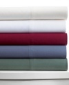 Relax and refresh in luxury. Layer your bed with this soft, wrinkle resistant fitted sheet, featuring 600-thread count cotton construction and your choice of five sophisticated hues.