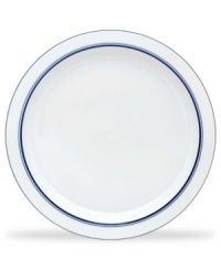 Named for a trendy Copenhagen neighborhood but designed with timeless style, the Christianshavn Blue serving platter features a double band of navy in pristine white porcelain. From Dansk.