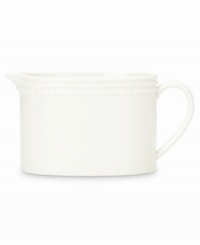 Dine with Wickford dinnerware and tie in timeless sophistication with every meal. Crafted in versatile white porcelain, this creamer features a contemporary, cylindrical shape embossed at the rim with a twisting rope pattern.