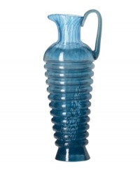 Crafted by renowned visual artist Kjell Engman, these pieces reflect the designer's endless imagination and passion for glass art. Inspired by the colors of the Mediterranean, the Corfu collection features whimsical shapes and unique style. Blue pitcher shown left.