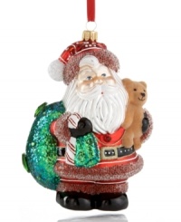 A jolly, happy soul! This mouth-blown glass Santa ornament from Vaillancourt is delicately crafted with gem, beaded and sparkling details for a brilliant addition to any Christmas tree.