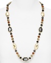 Faceted stones and delicate glass beads add instant interest to your neckline on this Carolee Lux necklace.