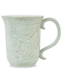 Sculpted blooms and a classic silhouette make the Toulouse mug by Fitz and Floyd a charming part of any casual landscape. A rustic green glaze adds to its antique appeal.