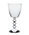 Baccarat redefines bold with the statuesque Vega wine glass. Premium crystal balancing a clear bowl and chunky, beaded stem exudes chic luxury in any setting.